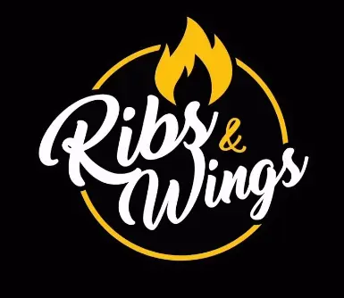 Alitas de pollo con salsa en Ribs & Wings